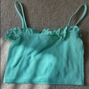 Adorable stretchy teal top from Zara with ruffles on the top